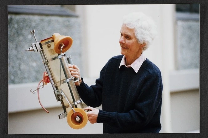 Dr Vida Mary Stout with scientific instrument