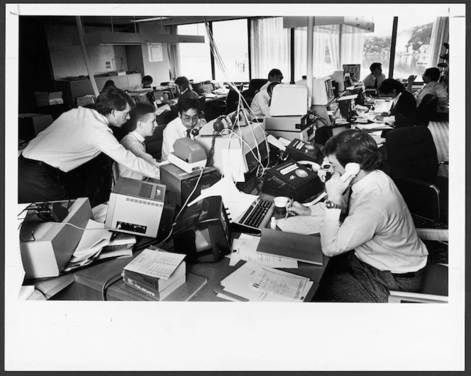 Brokers working in the futures room at Development Finance Corporation - Photograph taken by Stephen Wilson