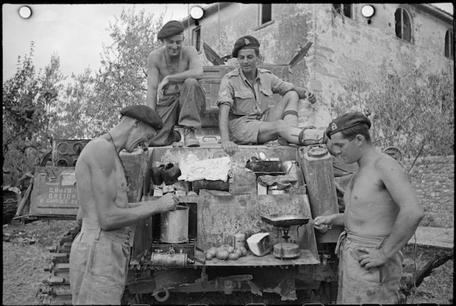 A New Zealand tank crew cooking a meal, Italy - Photograph taken by George Frederick Kaye