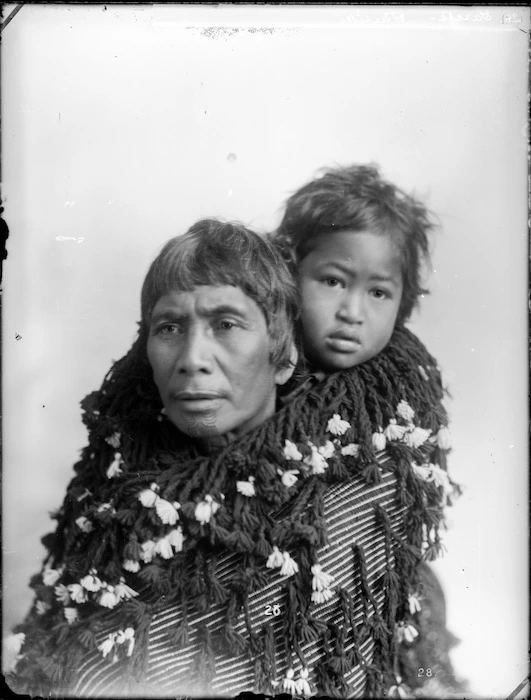 Maori woman carrying a baby on her back - Photograph taken by William Henry Thomas Partington