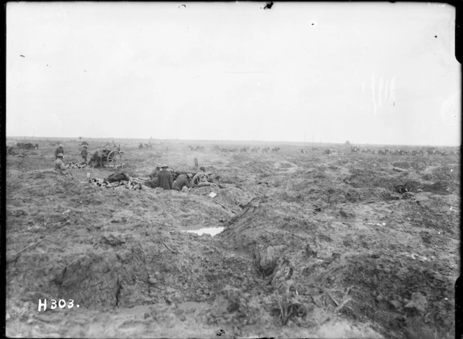 New Zealand artillery firing from shell-holes, Kansas Farm, Ypres Salient