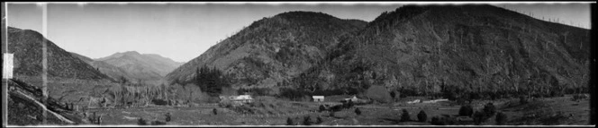 Farmhouse and outbuildings in valley, Nelson area