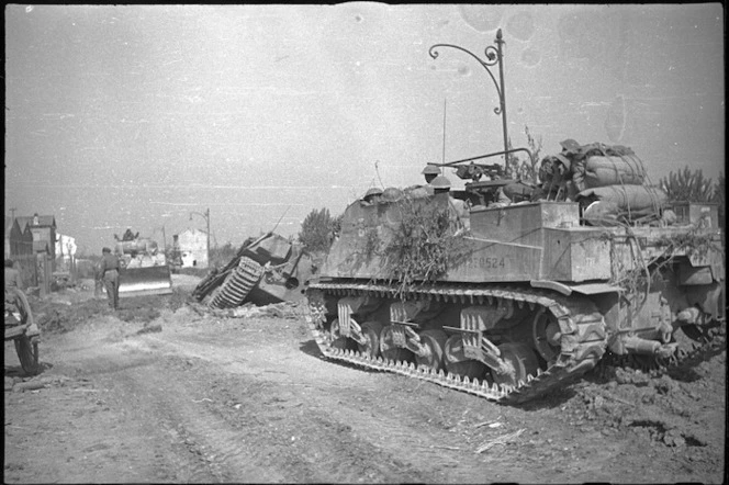 Sherman dozer preparing route for New Zealand tanks in Medicina, Italy