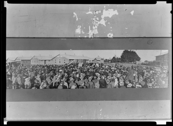 Large crowd gathered around podium, King's College, Remuera, Auckland