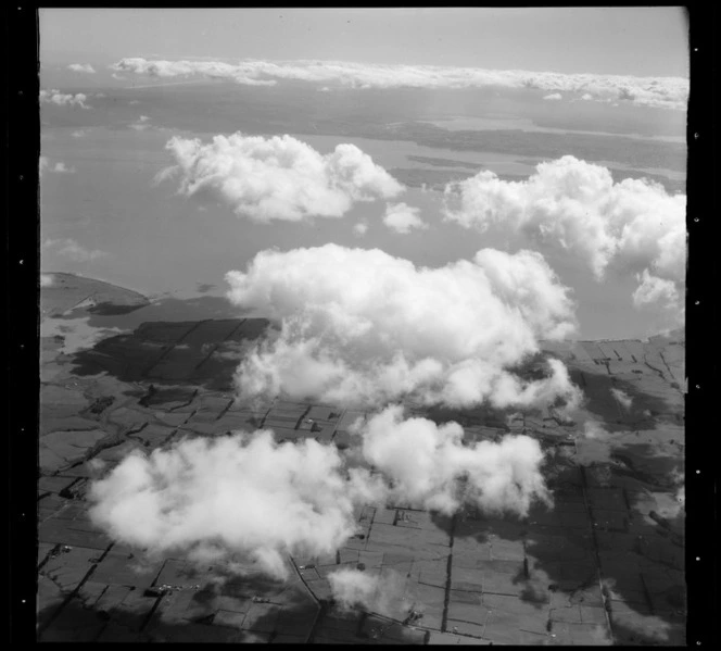 Clouds over farmland, south Auckland