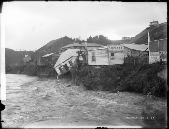 House falling into the Whanganui River during a flood, Wanganui