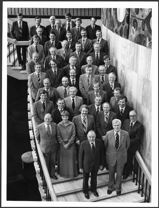 Prime Minister Robert Muldoon and members of the National Party caucus - Photograph taken by Ray Pigney for New Zealand Newspapers Ltd