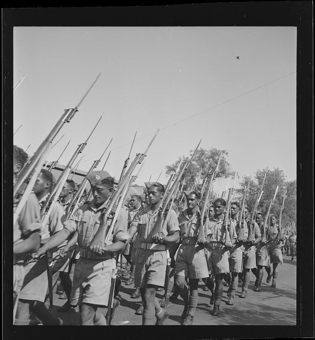 Members of the 28th New Zealand (Maori) Battalion marching in United Nations Day Parade, Cairo - Photograph taken by M D Elias