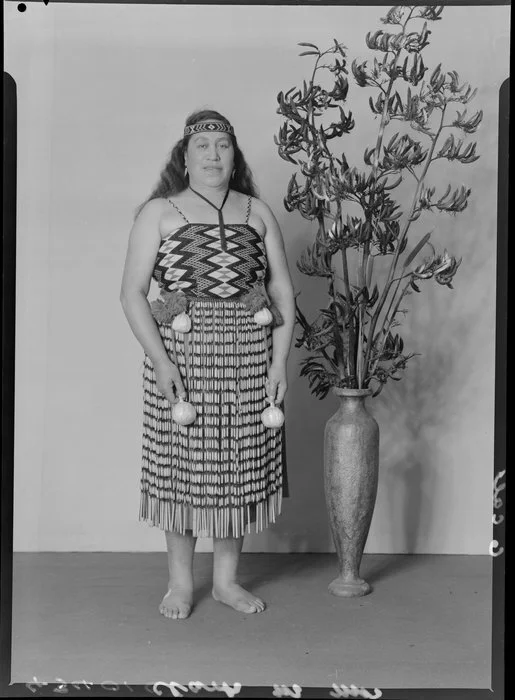 Probably Mrs M Clark, in traditional Maori clothing