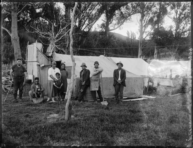 People standing outside a dwelling, Fernhill