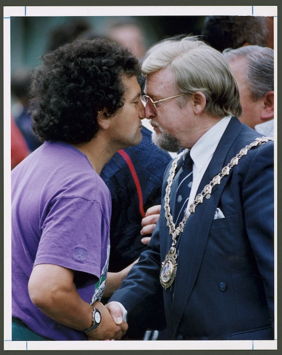 Mayor of Wanganui, Chas Poynter, greeting Ken Mair with a hongi - Photograph taken by Phil Reid