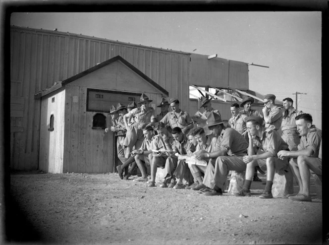 World War II soldiers waiting outside the cinema at Maadi Camp, Egypt - Photograph taken by George Kaye