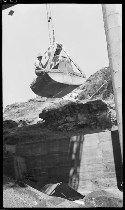 Man operating grab at Tarakohe Cement Works, Tasman District