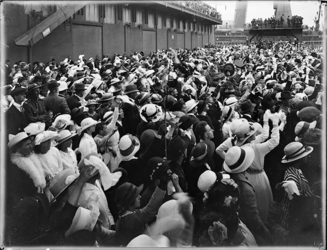 Crowd farewelling troops embarking for duty, World War One