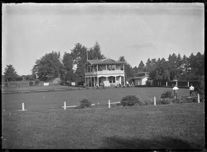 View of the bowling green and club house at Cambridge, circa 1920.