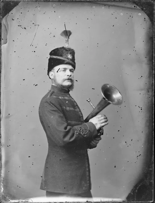 Unnamed bandsman, in uniform of Wanganui Rifle Volunteers, with euphonium