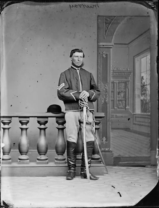 Mr Murray, in uniform, with sabre