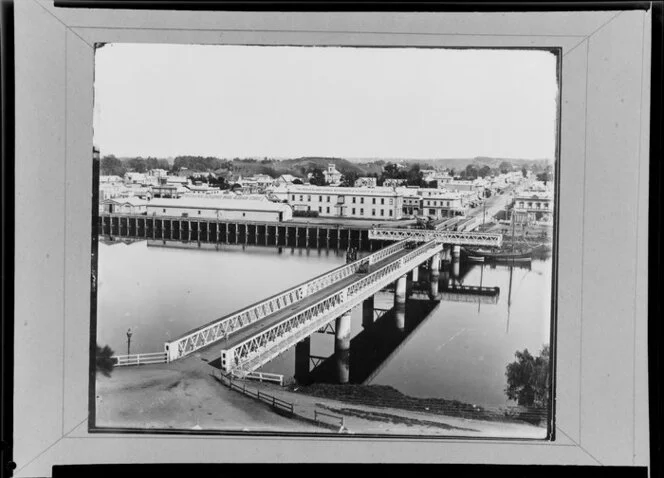 Bridge across Whanganui River, open for boats, looking toward wharf area, Whanganui