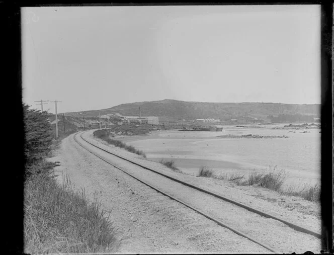 Unidentified piece of railroad track, with an estuary at low tide, probably at Bluff, Southlande