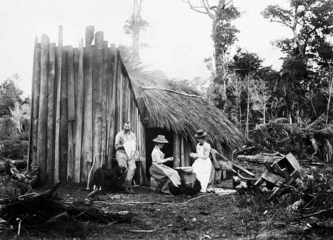 Group outside a timber camp hut