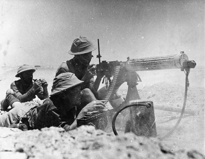 Paton, H fl 1942: NZ machine gunners in action at Minqar Qaim, Egypt