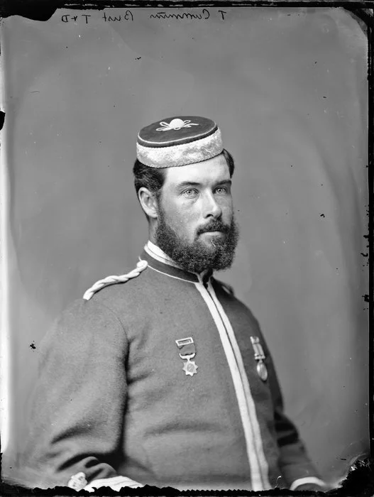 Mr T Cummins, in uniform with medals