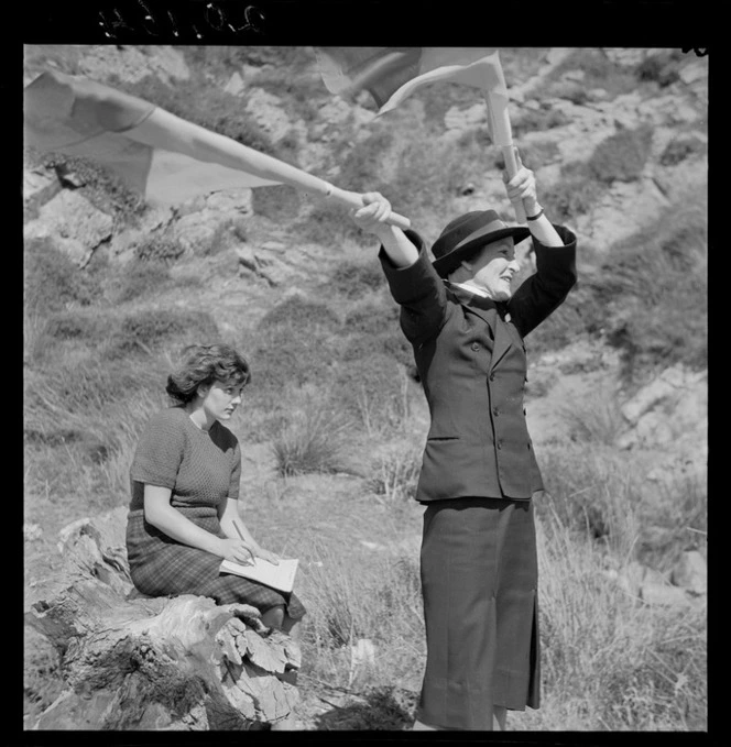Women's Royal New Zealand Naval Service recruit learning semaphore on Somes Island