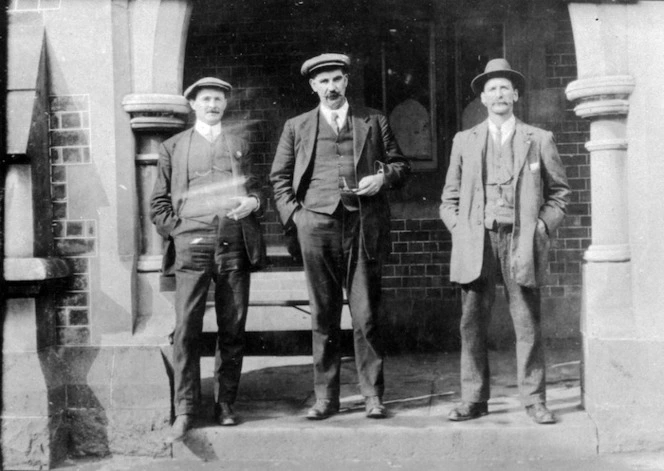 Mr T England, District Constable Andy Grant and District Constable William Cobeldick standing outside the Supreme Court, Auckland, during the trial of Rua Kenana Hepetipa