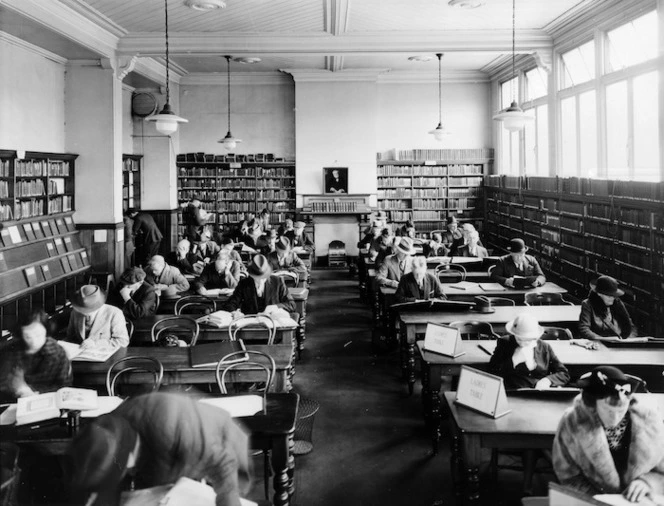 People sitting at tables in a library, Wellington