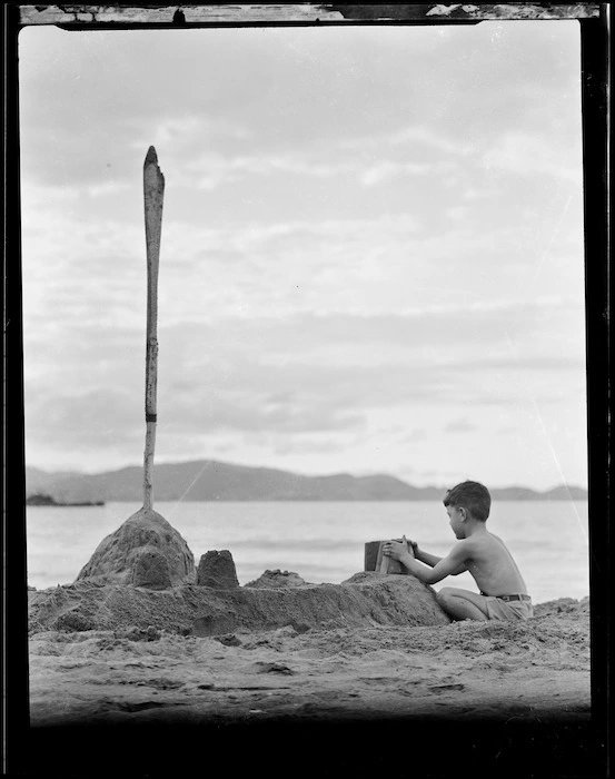 Robert Wells playing on the beach at Woolleys Bay