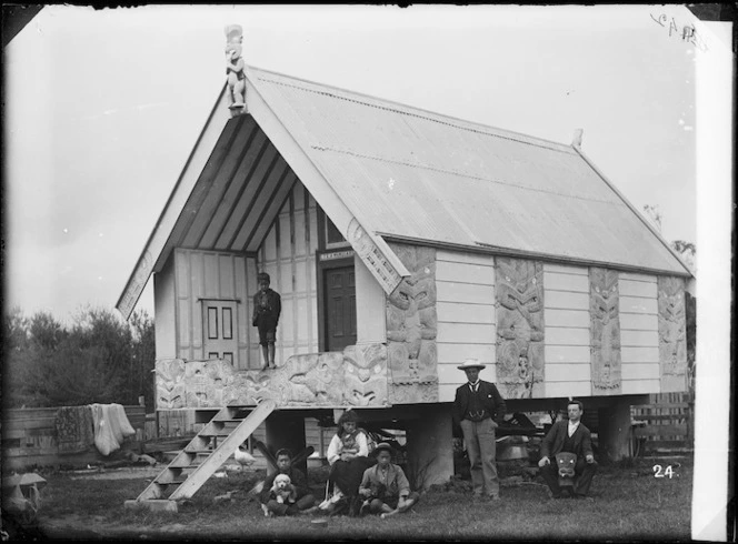 Creator unknown : Group near a whare, Putiki Pa