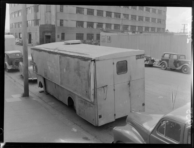 A damaged pie-cart near the Herd Street Post Office building, Wellington