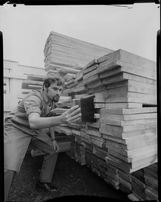 Man painting wood