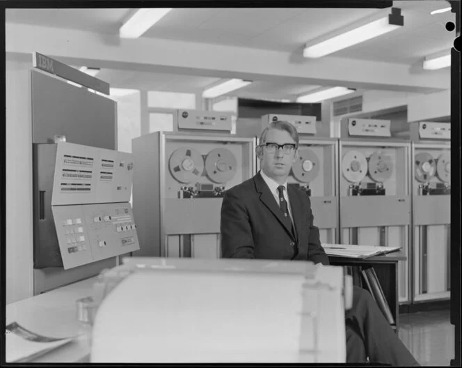 Portrait of man with computers