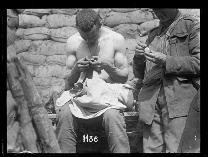 The search - a World War I soldier looking for lice