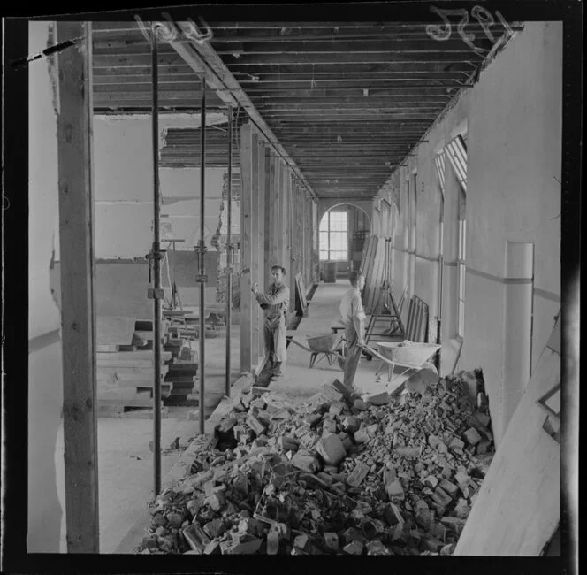 Workman work at repairing Clyde Quay School building, Mount Victoria, Wellington