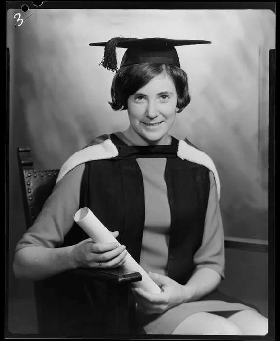 Meyer, woman in academic gown & mortarboard