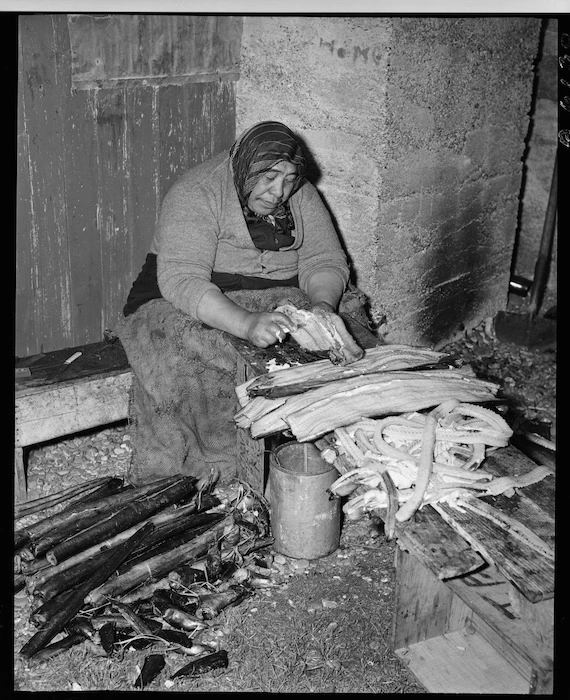 Mrs Nutira boning eels, Lake Forsyth, Canterbury - Photograph taken by K V Bigwood