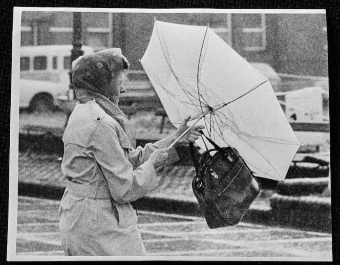 Woman with inverted umbrella, Wellington
