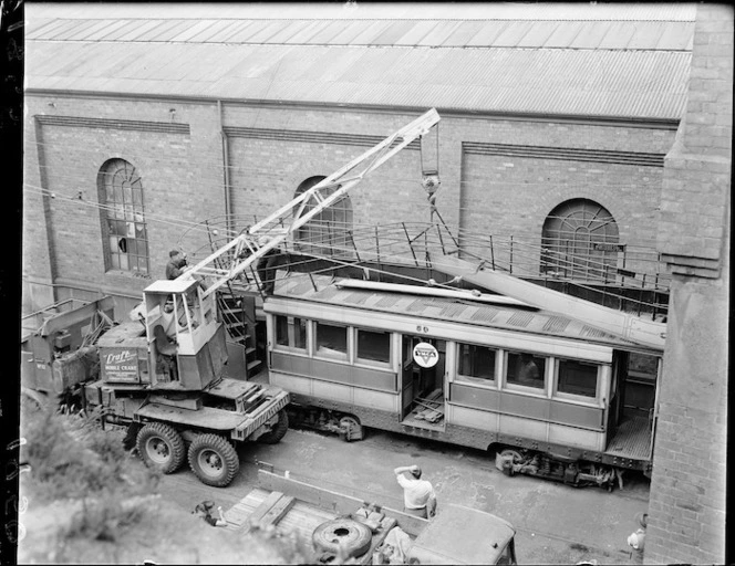 Tram car and mobile crane