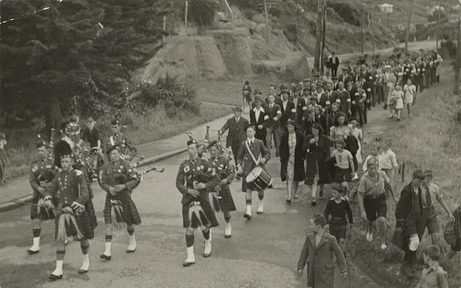 Members of the Home Guard being led by pipers, through Ngaio, Wellington