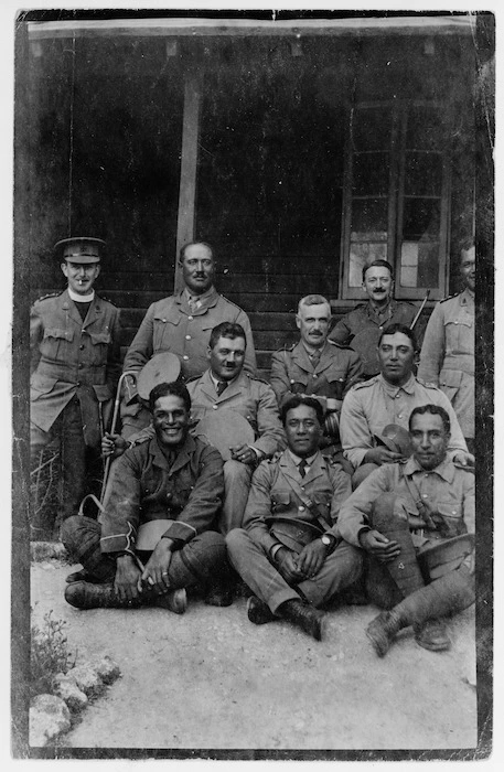 Group of people including Sir Peter Buck, who is in the centre row at the far right