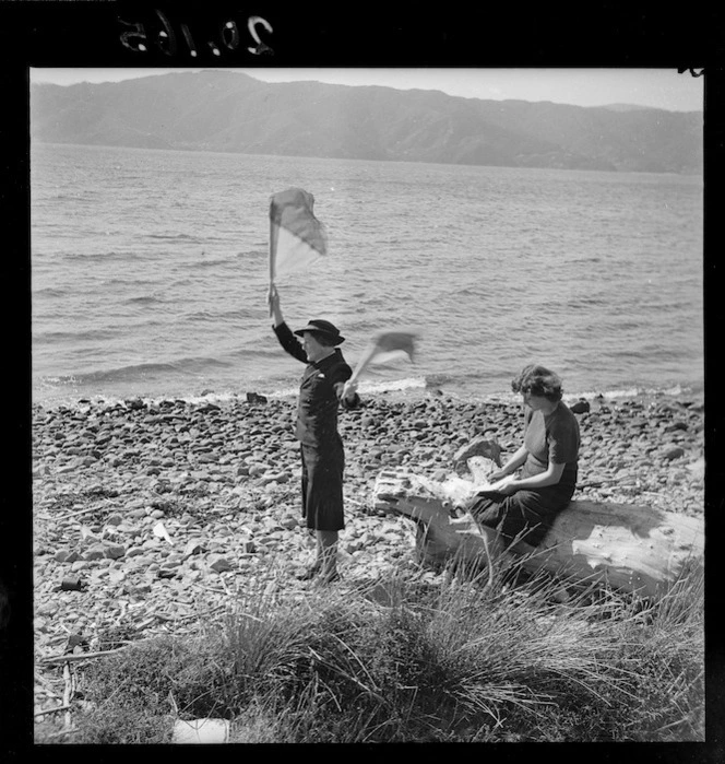 Women's Royal New Zealand Naval Service recruit learning semaphore, Somes Island, Wellington