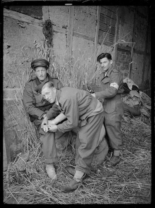 Medical orderlies tending to officer - Photograph taken by Lee Hill