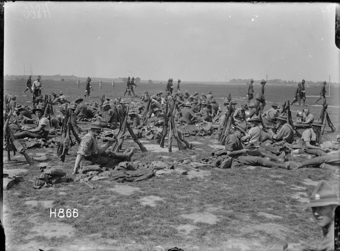Soldiers resting after training, Pas-en-Artois, France