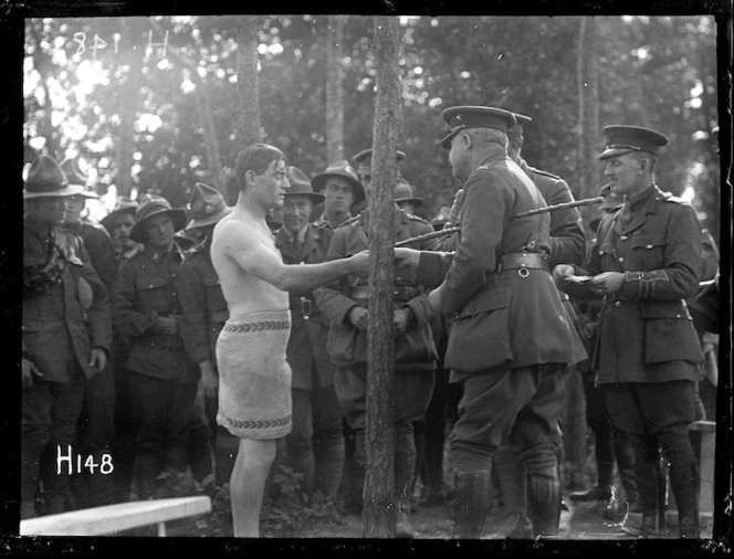Brigadier General Braithwaite presenting a prize at the New Zealand Division water sports, World War I