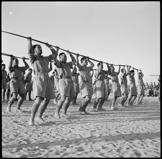 Maori Battalion performing a haka for the King of Greece, at Helwan, Egypt, during World War 2