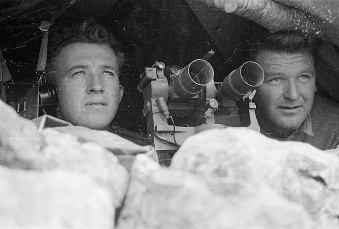 World War II soldiers from New Zealand looking out from a forward observation post in the Cassino area, Italy - Photograph taken by George Kaye