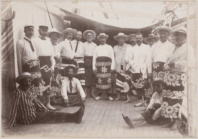 New Zealand Parliamentarians dressed in lavalavas, white shirts, and hats