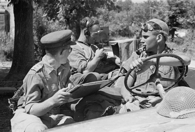 World War II soldiers from New Zealand during a signals communication from a reconnaissance jeep outside Sora, Italy, just before the town fell - Photograph taken by George Kaye